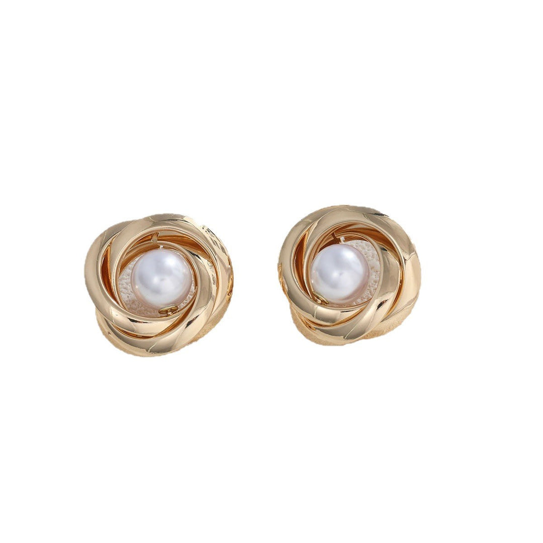 Women's pearl earrings with elegant gold frame Nin Boutique