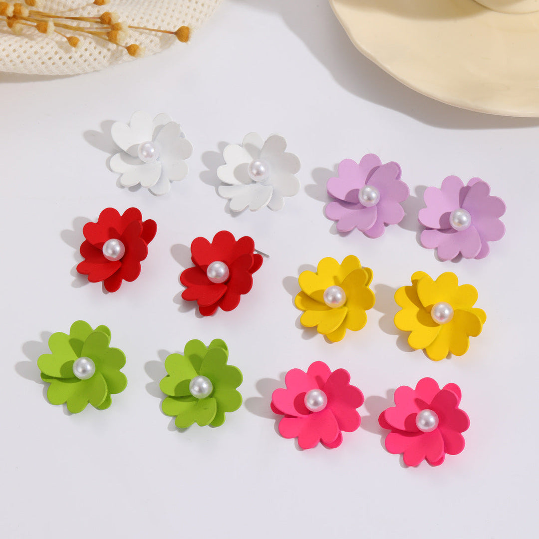 Women's earrings with vibrant floral design and stylish pearl accents Nin Boutique