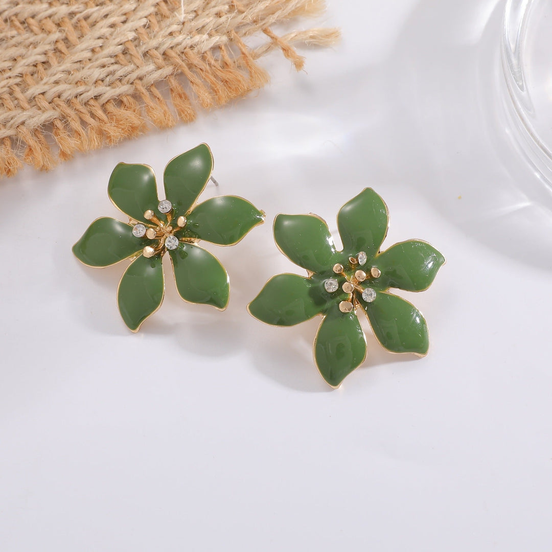 Women's earrings with intricate floral pattern and sparkling accents Nin Boutique