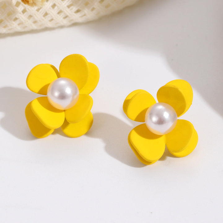 Ladies earrings in vibrant floral design with pearl accent Nin Boutique