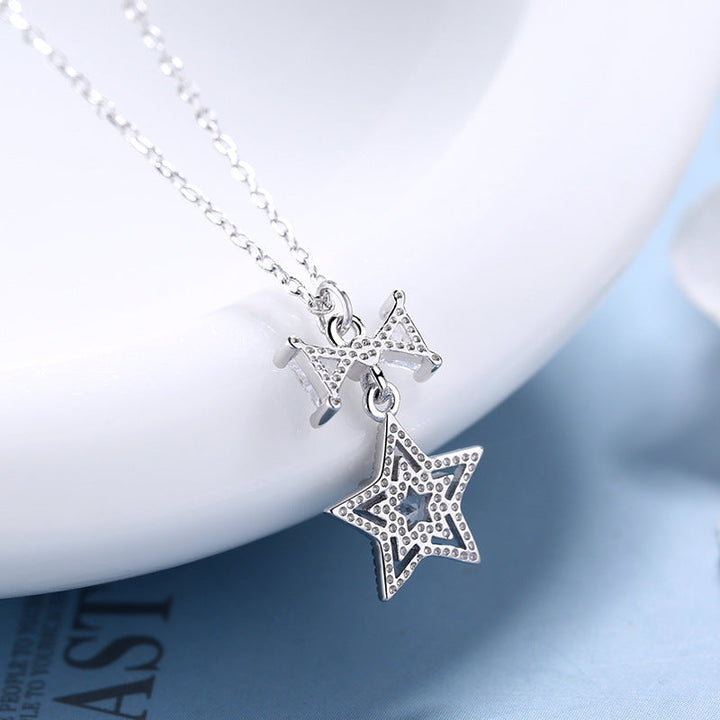 Women's necklace with sparkling star and bow pendant Nin Boutique