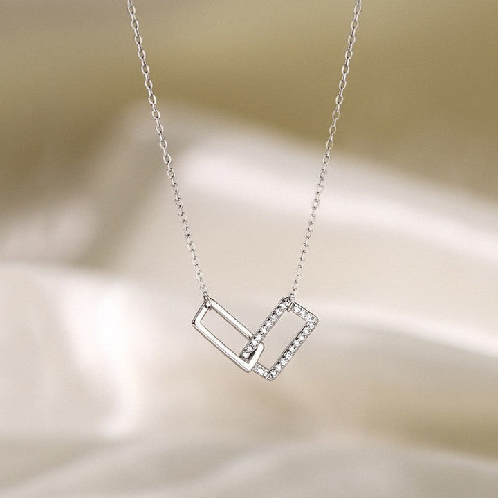 Women's necklace with modern, geometric pendants Nin Boutique