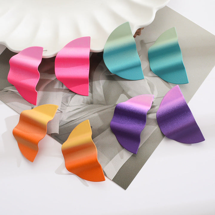 Women’s earrings in modern wave design Nin Boutique