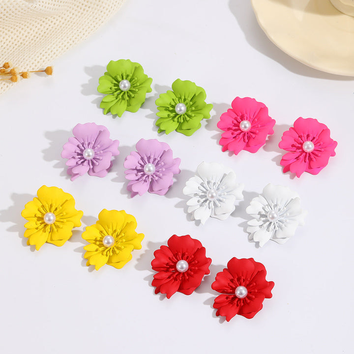 Ladies earrings with elaborate floral pattern Nin Boutique