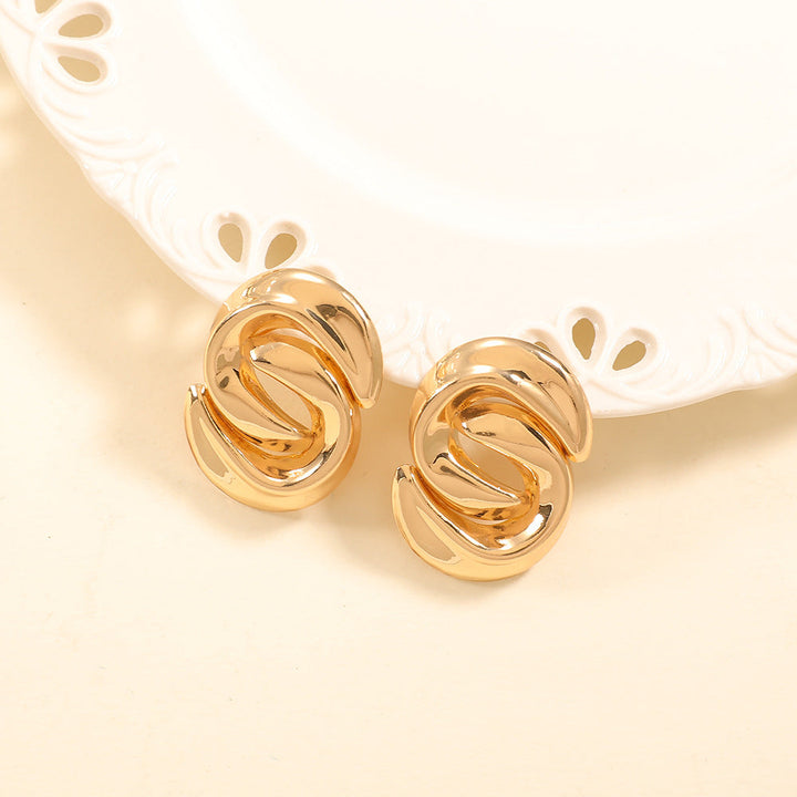 Ladies earrings with elegant, curved design Nin Boutique 1784077352