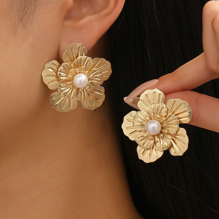 Women's earrings with artistic flower design and pearl accents Nin Boutique