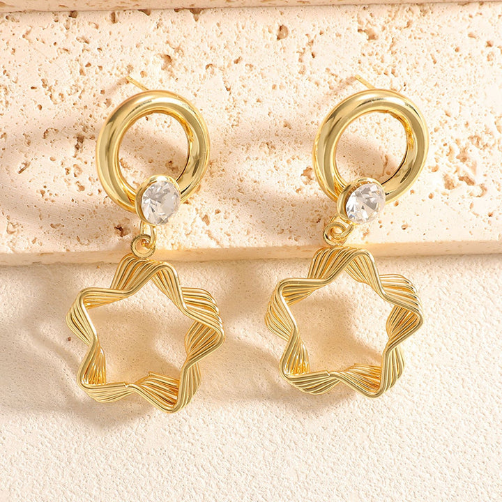 Ladies earrings with elaborate star design Nin Boutique