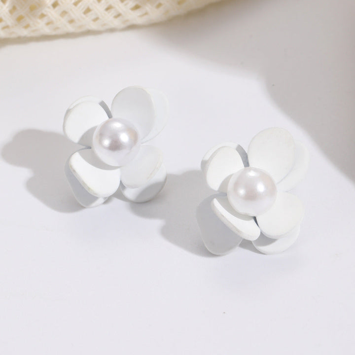Ladies earrings in vibrant floral design with pearl accent Nin Boutique