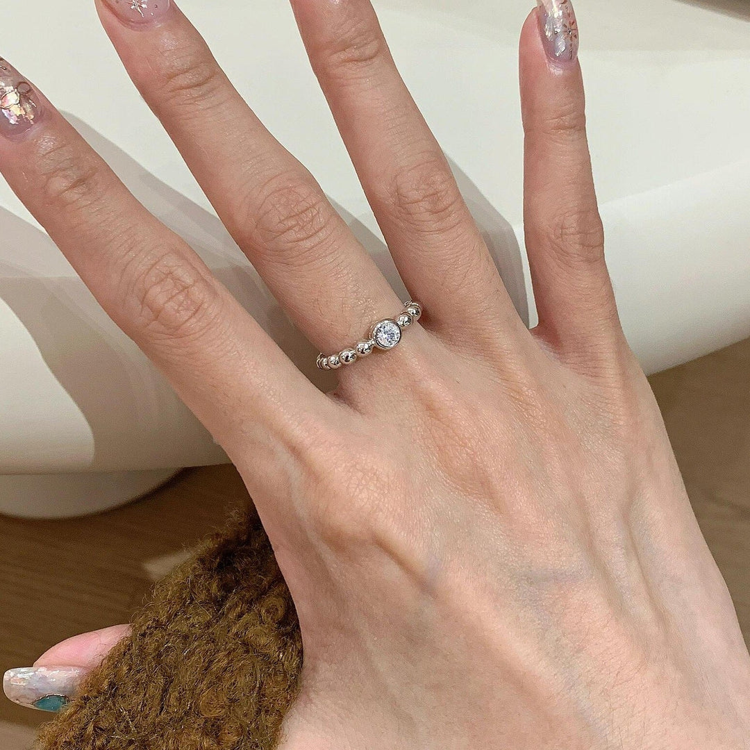 Women's ring with sparkling zircon and ball design Nin Boutique