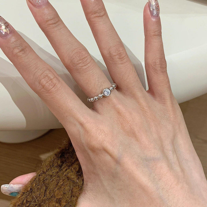 Women's ring with sparkling zircon and ball design Nin Boutique