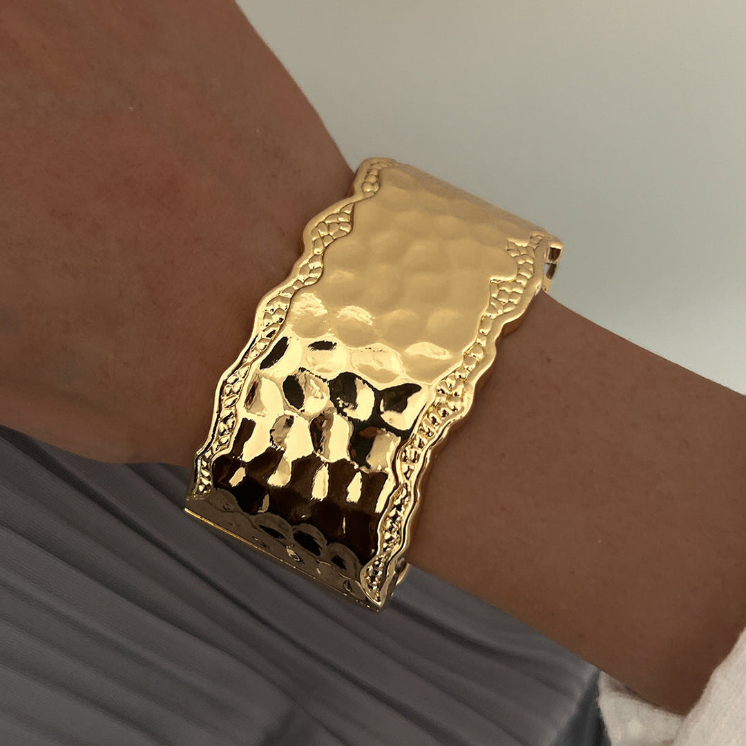 Ladies bangle with intricate hammered design Nin Boutique