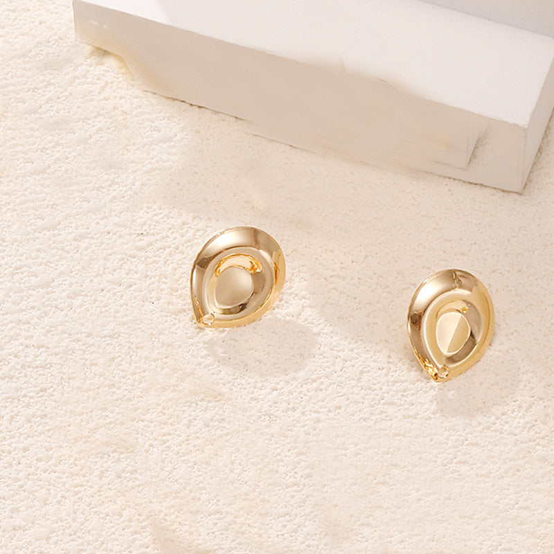 Ladies earrings in artistic face design Nin Boutique