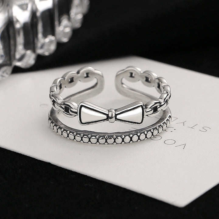 Ladies fashionable ring with playful bow design and elegant details Nin Boutique