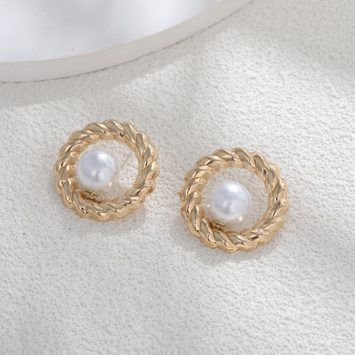 Ladies earrings with heart-shaped design and artificial pearl Nin Boutique