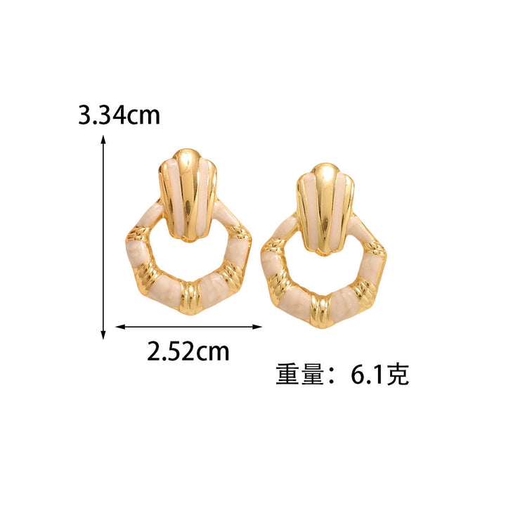 Ladies earrings in elegant shell design Nin Boutique
