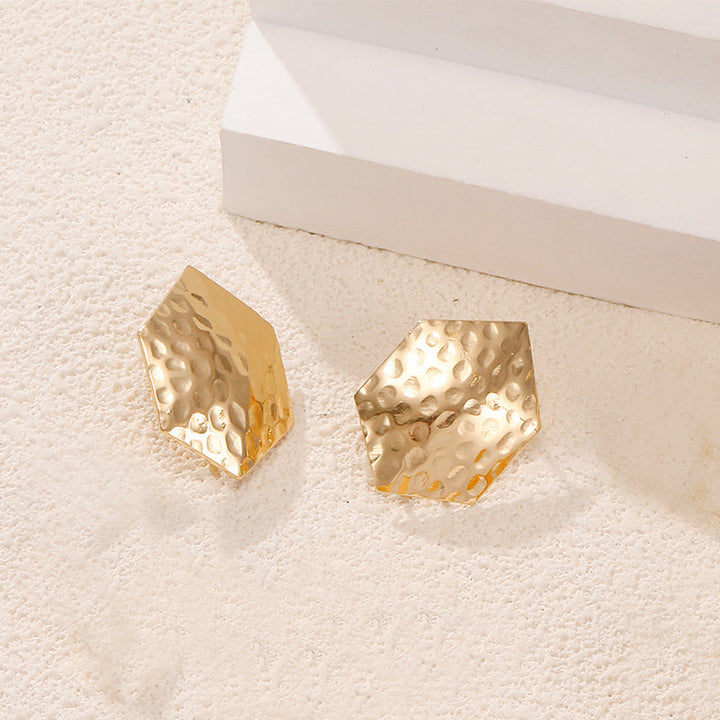 Ladies earrings in artistic face design Nin Boutique