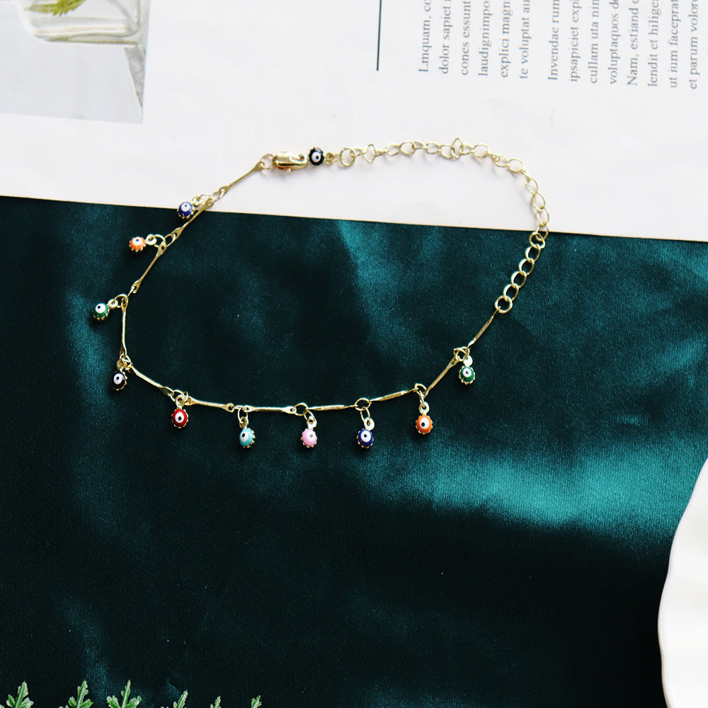 Ladies ankle bracelet with colorful eye charms and elegant chain Nin Boutique