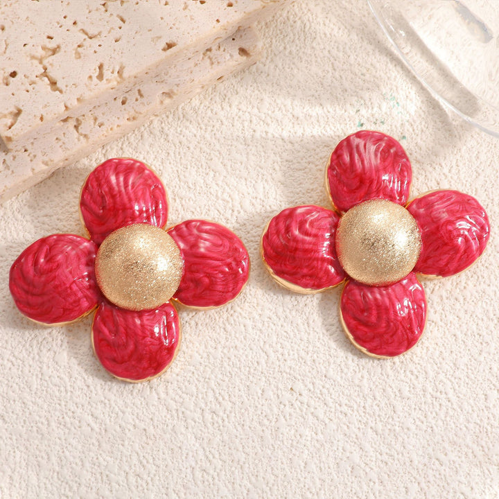 Ladies earrings in elaborate flower pattern Nin Boutique