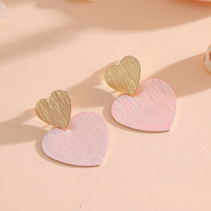 Ladies earrings in modern heart design Nin Boutique