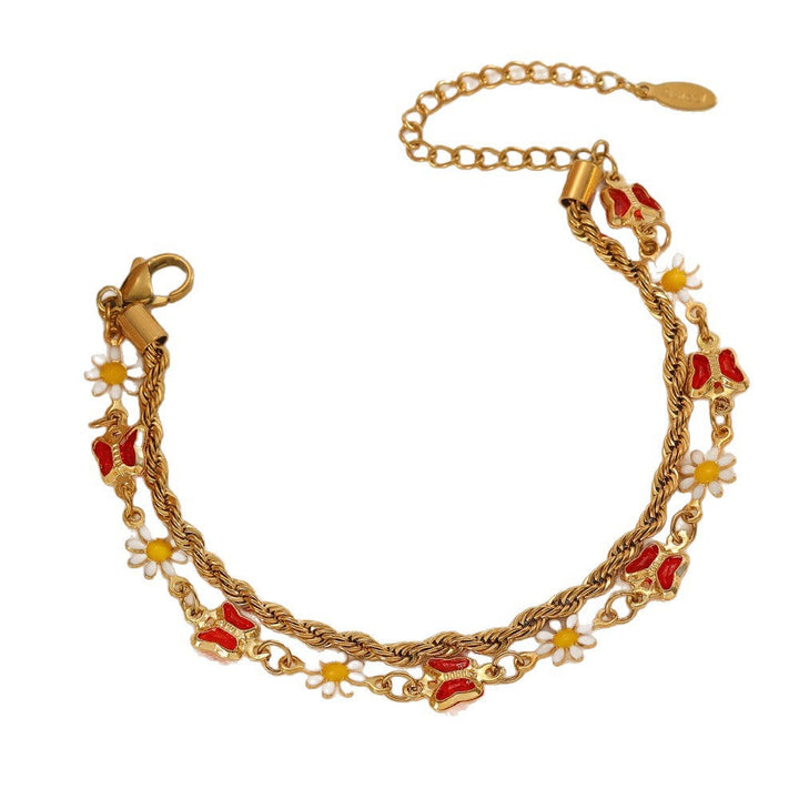 Ladies bracelet with elaborate pendants Nin Boutique