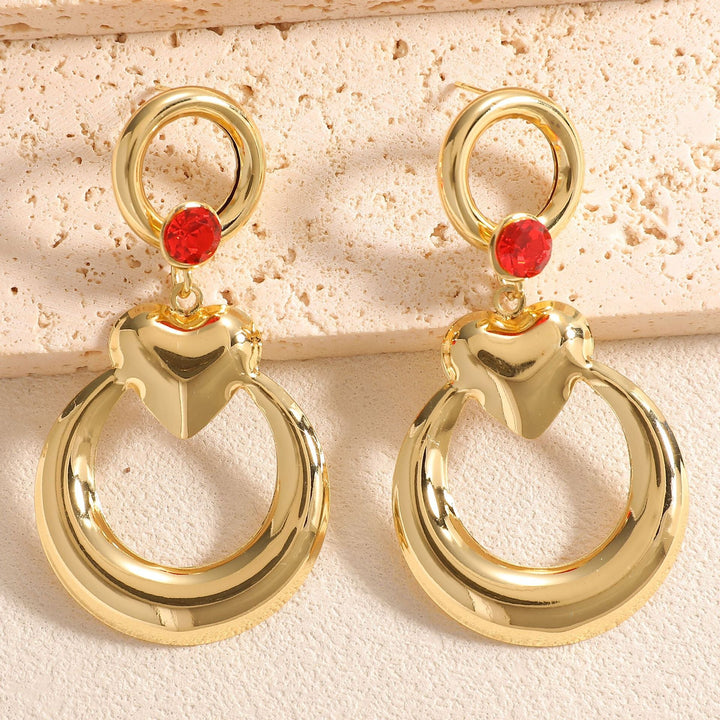 Ladies earrings with modern heart and ring design Nin Boutique
