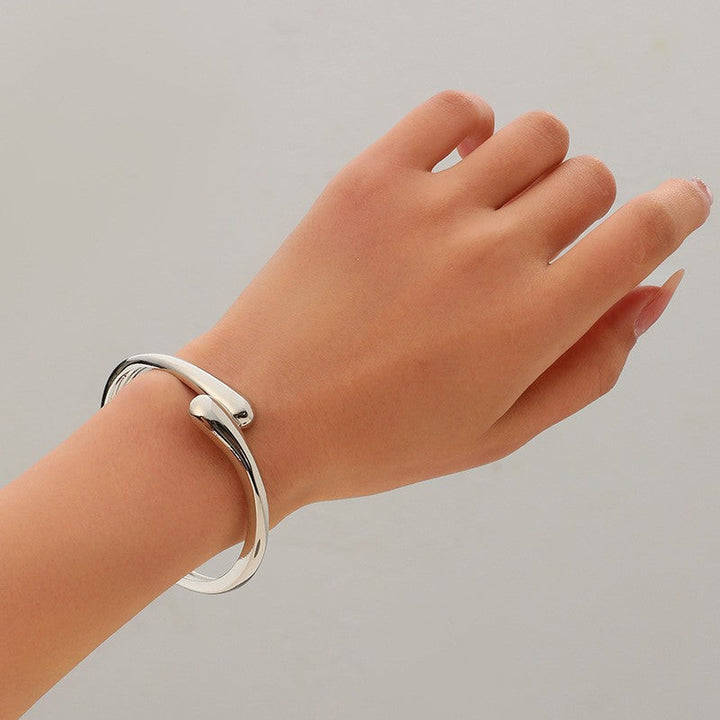 Women's Open Cuff Bracelet with Modern, Curved Design Nin Boutique