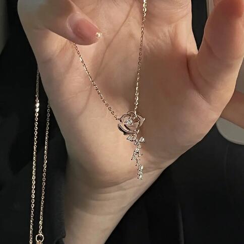 Women's necklace with delicate rose pendant and sparkling accents Nin Boutique