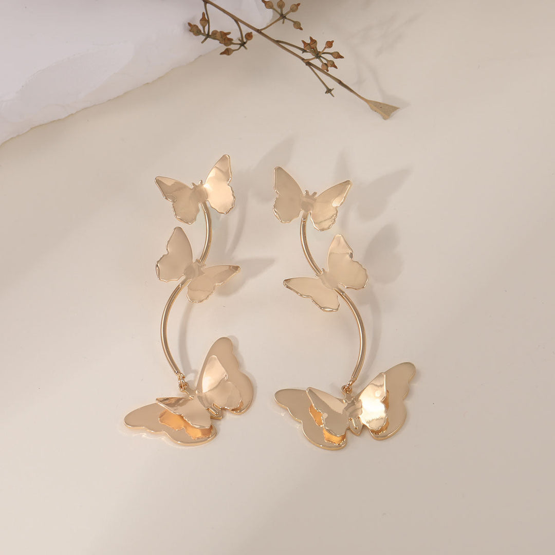 Ladies earrings with intricate butterfly design Nin Boutique