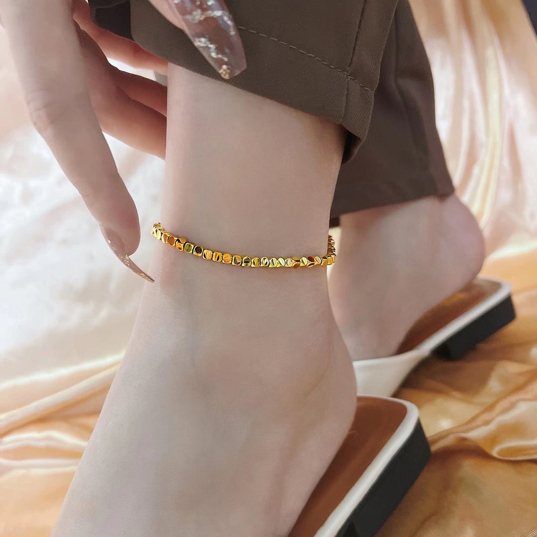 Women's filigree anklet made of shiny metal Nin Boutique