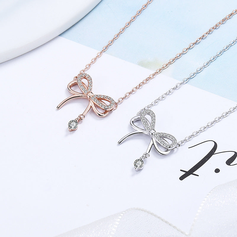 Women's necklace with intricate bow pendant and sparkling zirconia Nin Boutique