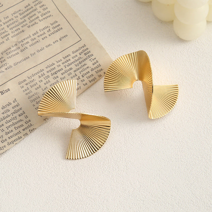 Ladies earrings with elaborate fan design Nin Boutique