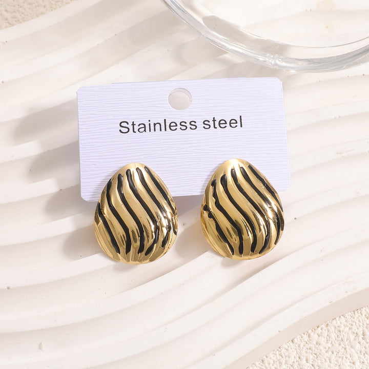 Women's earrings with intricate wave pattern Nin Boutique