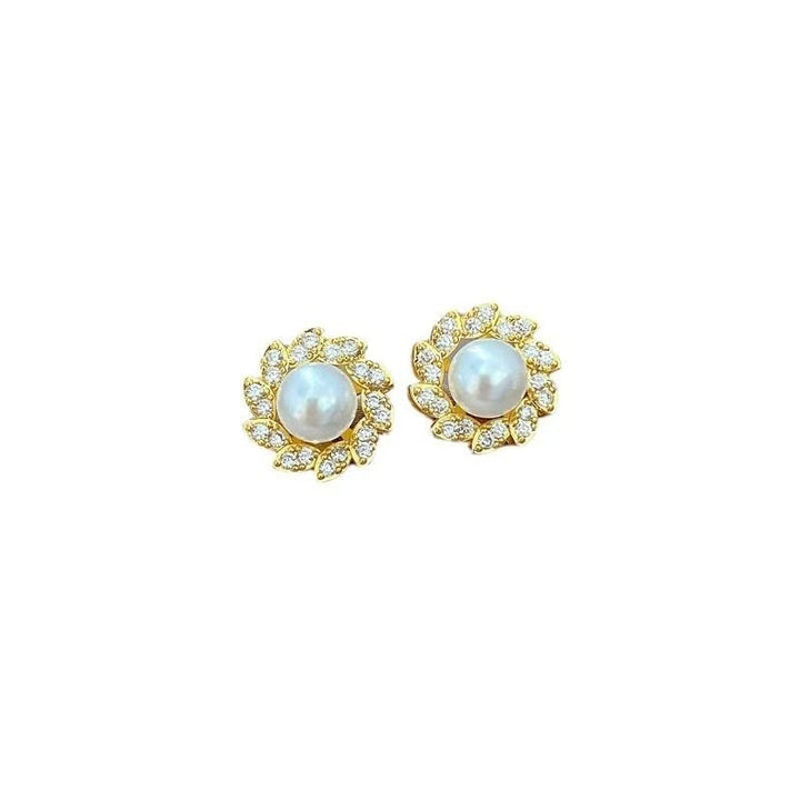 Women's luxury pearl halo cocktail ring with cubic zirconia petal accents and adjustable band Nin Boutique