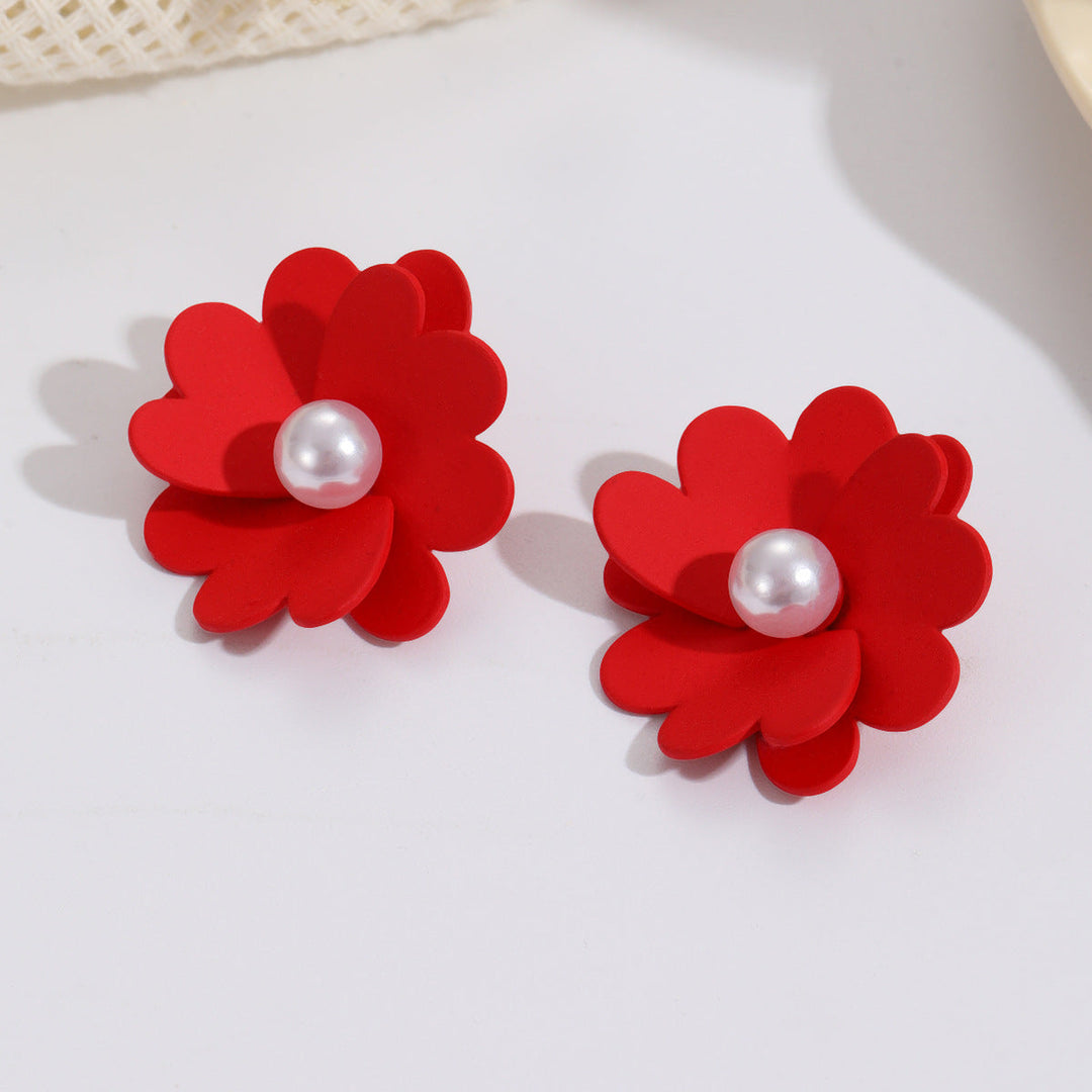 Women's earrings with vibrant floral design and stylish pearl accents Nin Boutique