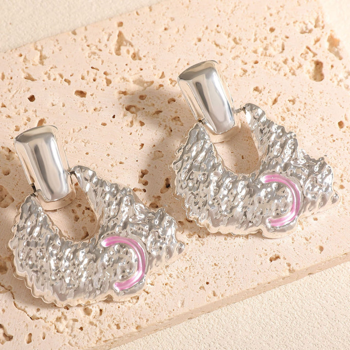 Women's earrings in artistic relief design Nin Boutique