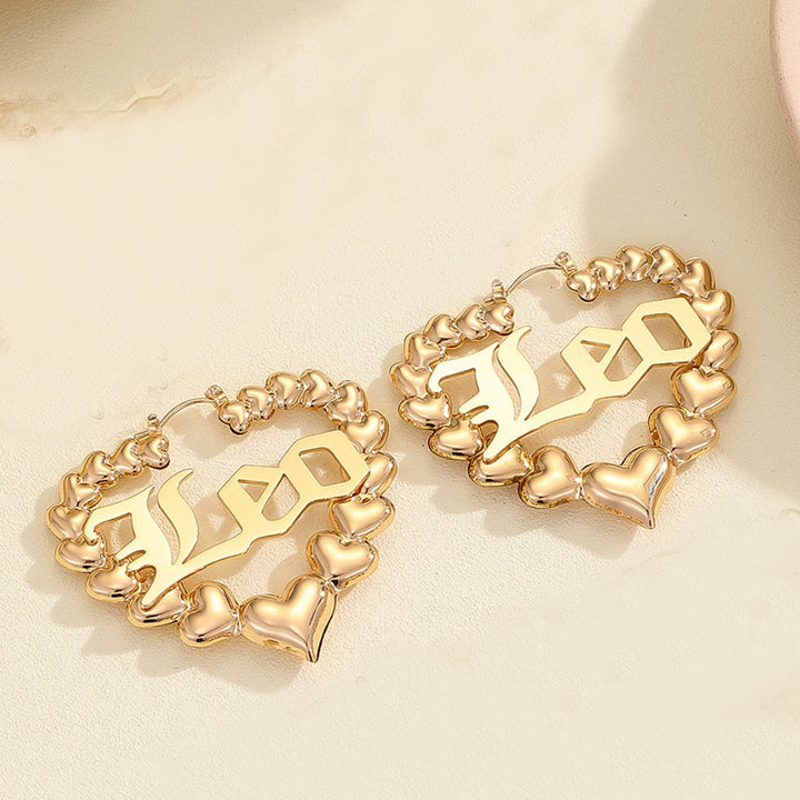 Women’s earrings with unique heart design and astrological element Nin Boutique