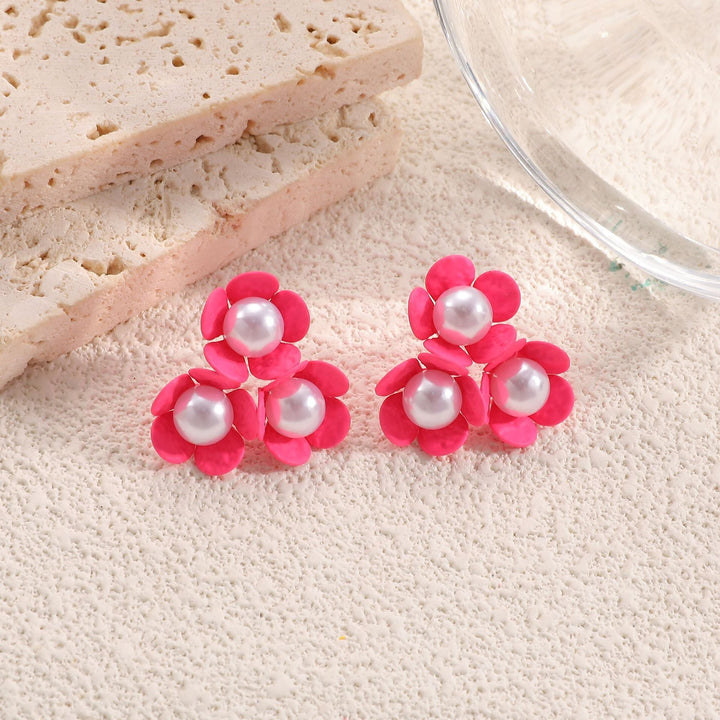 Ladies earrings in artistic floral style with pearl accent Nin Boutique