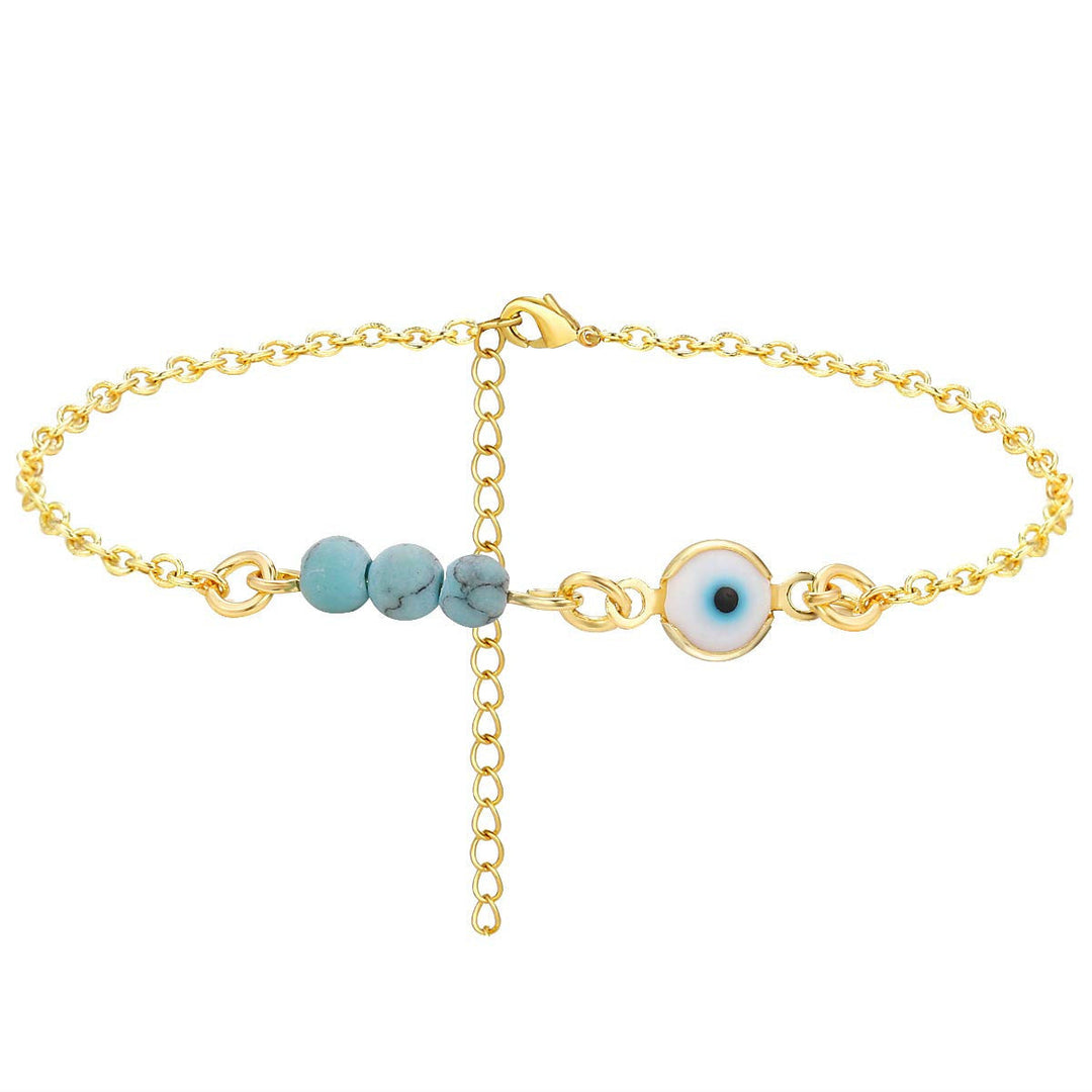 Ladies anklet with protective eye motif and colorful gemstone accents Nin Boutique