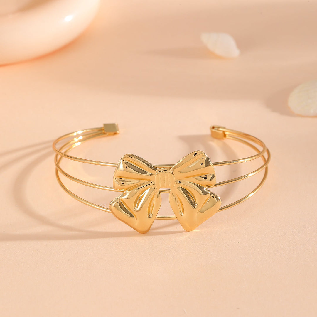 Women's bangle with elaborate bow design Nin Boutique