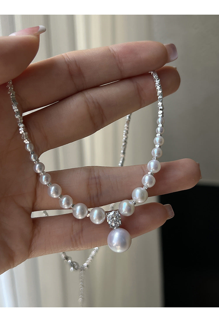 Women's necklace with shimmering pearls and sparkling details Nin Boutique