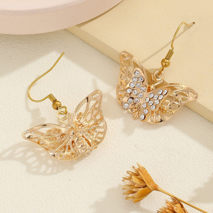 Ladies earrings with intricate butterfly design Nin Boutique
