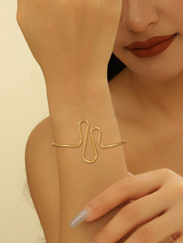 Women's bangle in modern wave pattern Nin Boutique