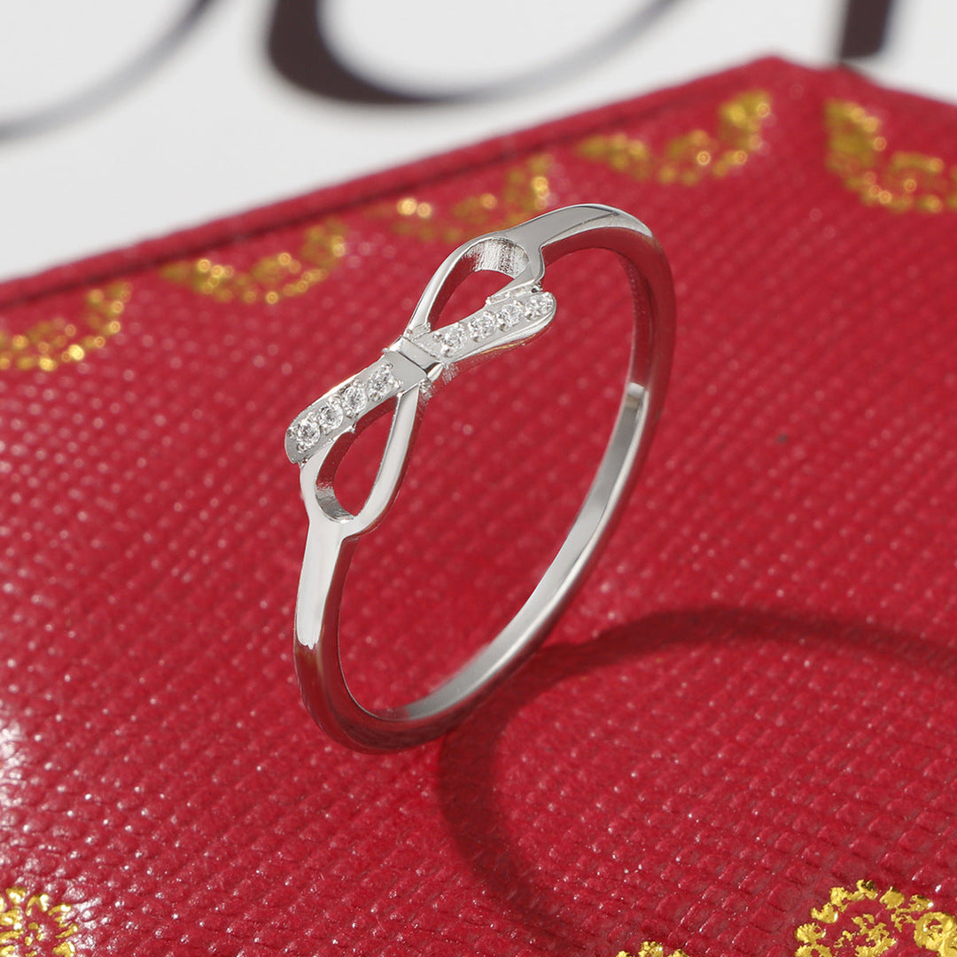 Women’s ring with trendy bow design and sparkling accents Nin Boutique