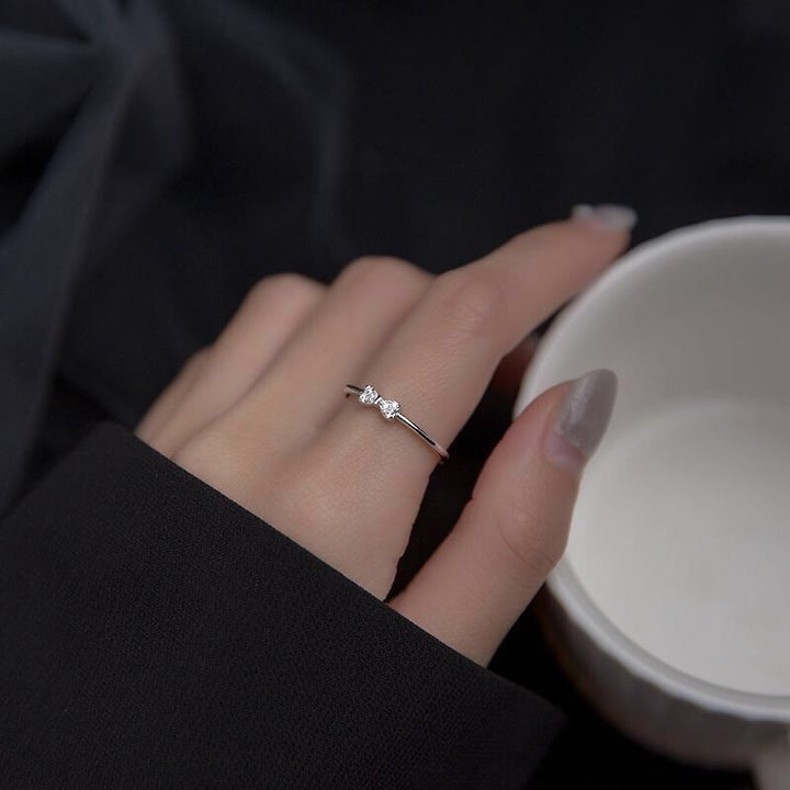 Women's ring with intricate bow motif and sparkling zirconia by Nin Boutique