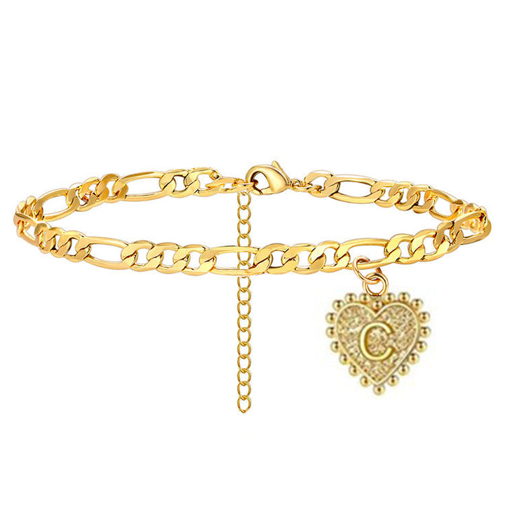 Ladies ankle bracelet with heart charm and elegant chain structure Nin Boutique