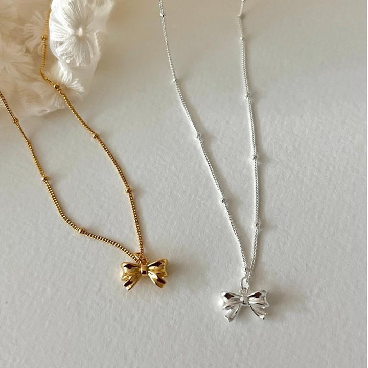 Ladies necklace with elegant bow pendant made of high-quality stainless steel Nin Boutique