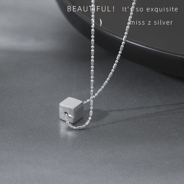 Women's necklace with modern, geometric cube pendant Nin Boutique