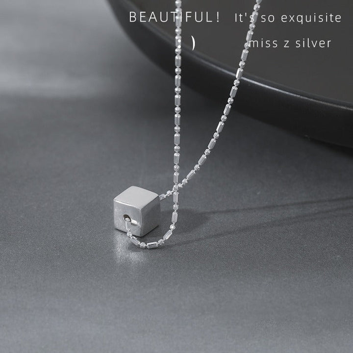 Women's necklace with modern, geometric cube pendant Nin Boutique