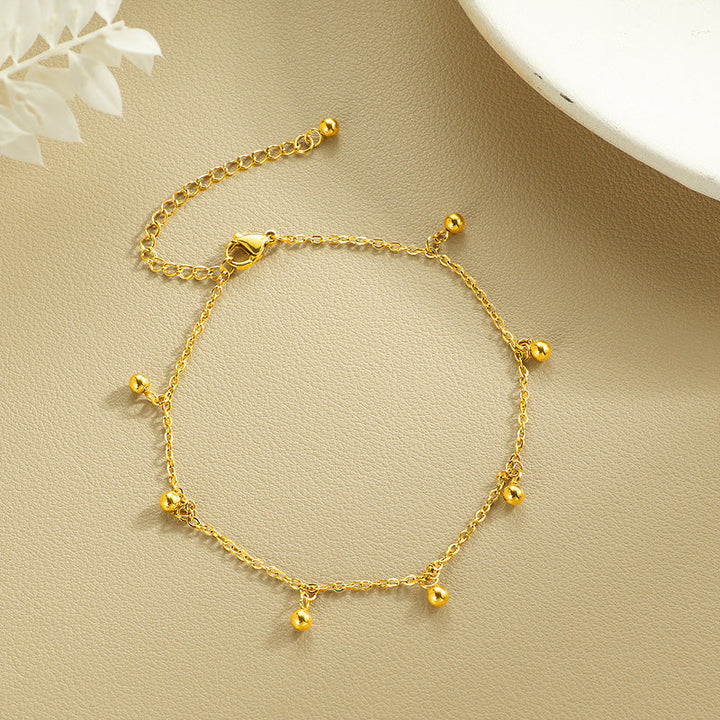 Ladies ankle bracelet with elegant pendulum charms Nin Boutique