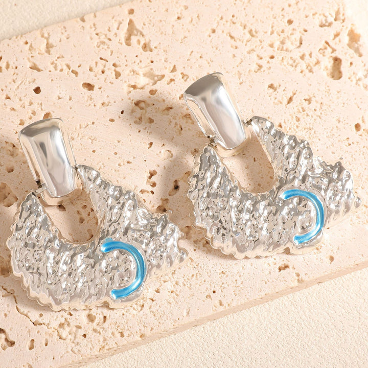 Women's earrings in artistic relief design Nin Boutique